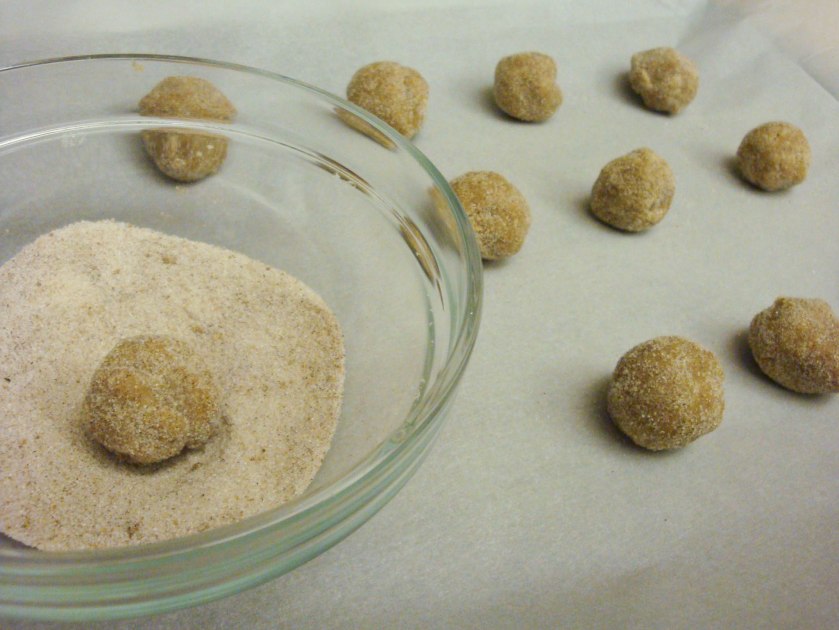 Rolling the Dough in the Sugar-Spice Mixture